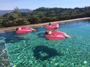 Il Borghino Retreat Centre - Pool Time Relaxing in inflatable love hearts