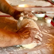 Yoga in Italy Cooking Class showing experienced hands making of dough for potato gnocchi. Yoga Retreat Italy