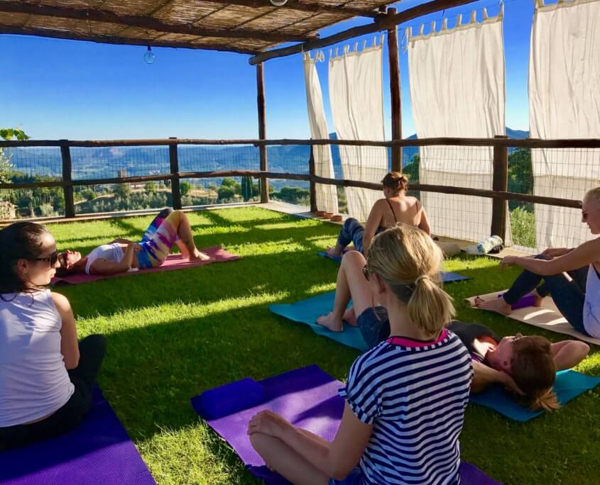 Yoga in Italy afternoon yoga practice up at panoramic outdoor yoga platform